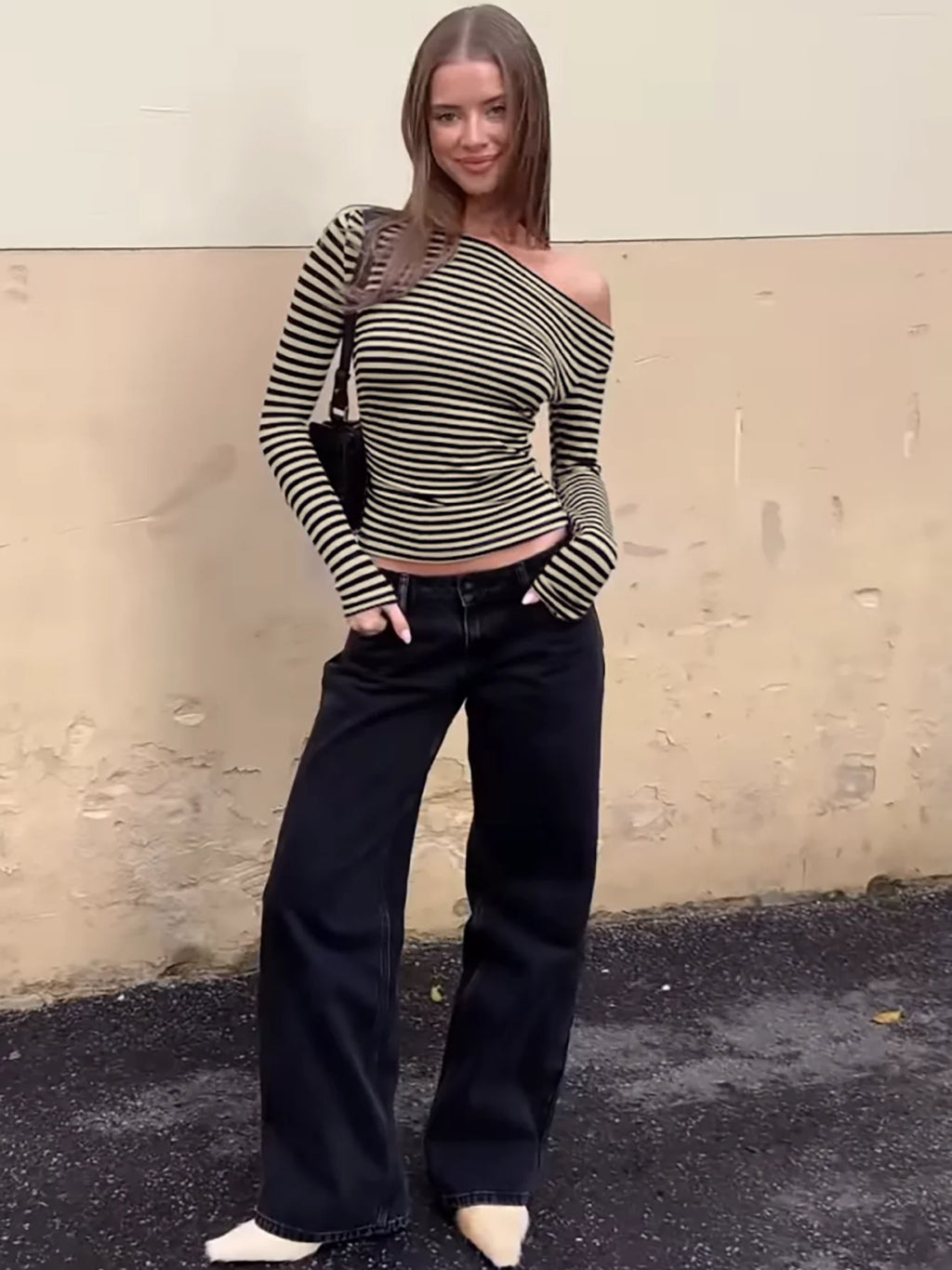 black and white stripped long sleeved off-shoulder top