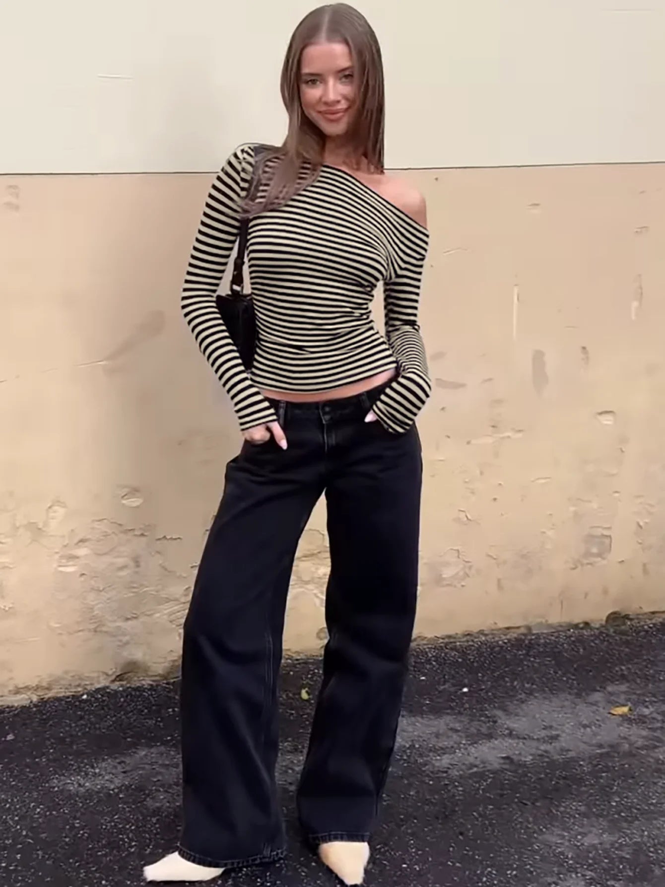 black and white stripped long sleeved off-shoulder top