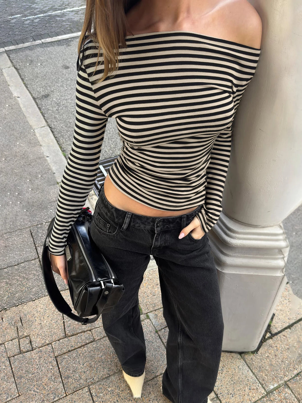 black and white stripped long sleeved off-shoulder top