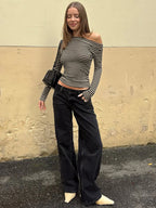 black and white stripped long sleeved off-shoulder top