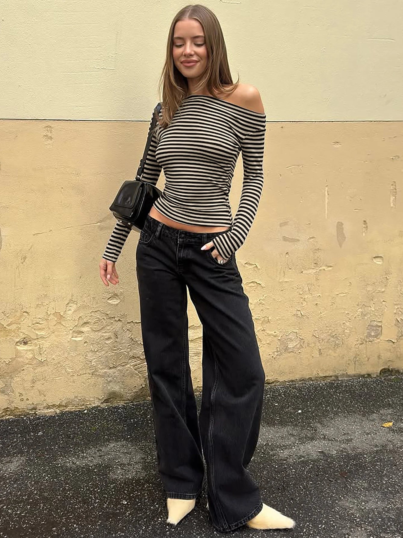 black and white stripped long sleeved off-shoulder top